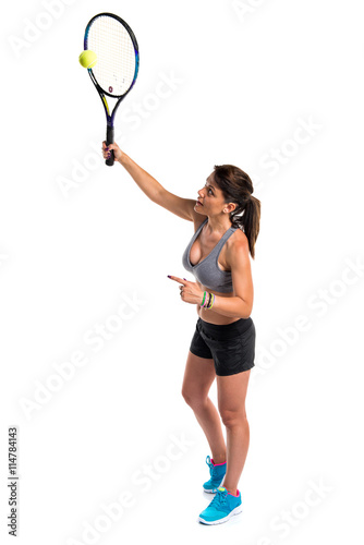 Pretty woman playing tennis