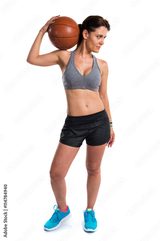 Sport woman playing basketball