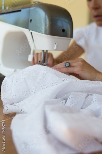 seamstress making a dress