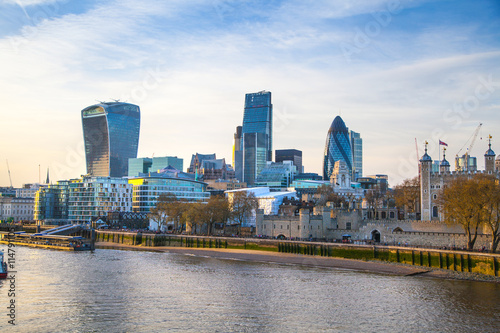 LONDON, UK - APRIL 15, 2015: City of London view from the South bank of the river Thames at sunset. 