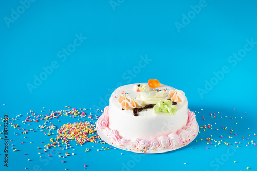 Beautiful big cake. Birthday cake on color background