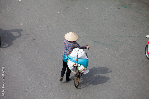 Hanoi, Vietnam, september 30, 2014: Life in Vietnam- Hanoi,Vietnam Street vendors in Hanoi's Old Quarter photo