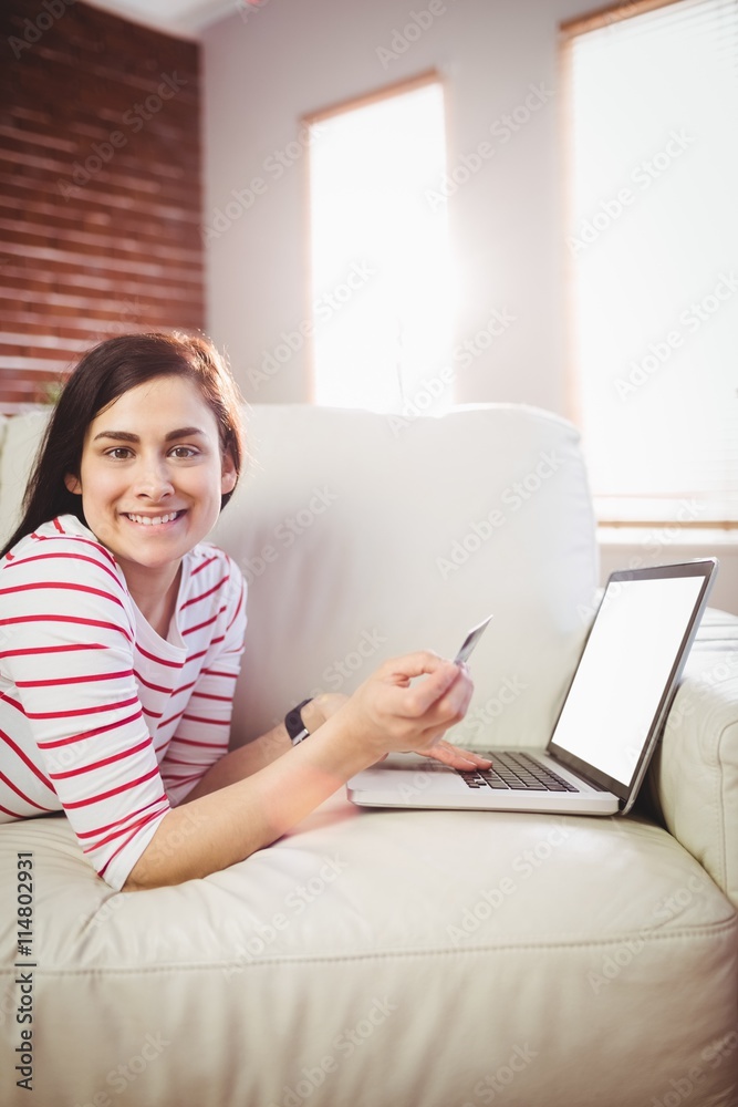Portrait of young woman using laptop Portrait of young woman using laptop