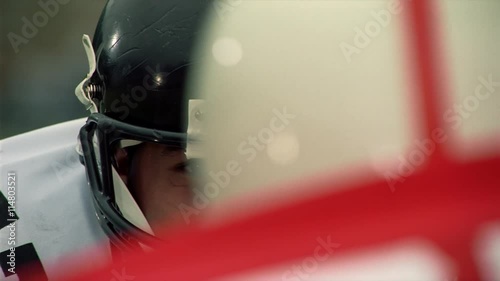 Close-up of two opposing football players at line of scrimmage