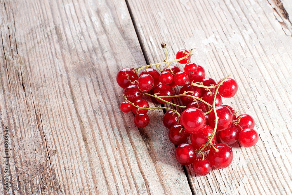 redcurrants on an old board