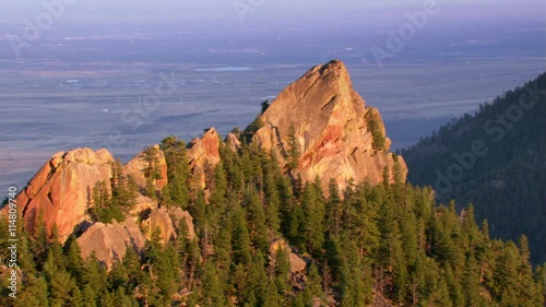 Flight over red rock peak in Colorado Rockies