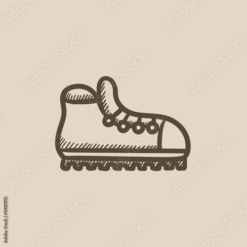 Hiking boot with crampons sketch icon.