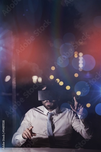 Businessman using virtual reality device