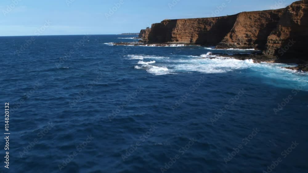 Flying past cliffs along the North Shore of Hawaii Flying past cliffs along the North Shore of Hawaii