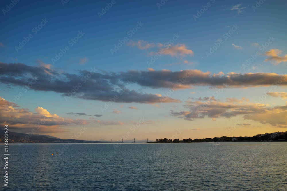 Amazing Sunset over The cable bridge between Rio and Antirrio view from Nafpaktos, Patra, Western Greece
