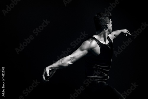 Composite image of side view of man throwing discus