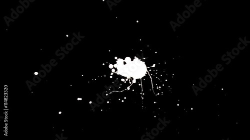 Falling drops of white paint