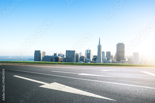 empty road with cityscape and skyline of san francisco in sunny