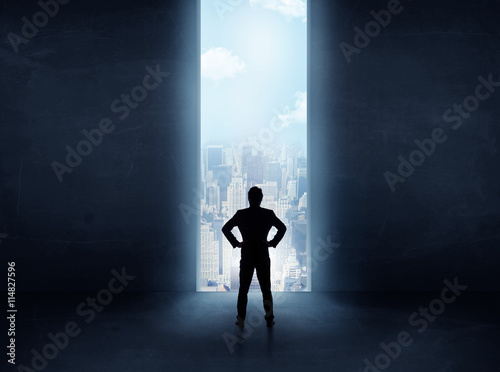 Photography businessman in front of the huge gate