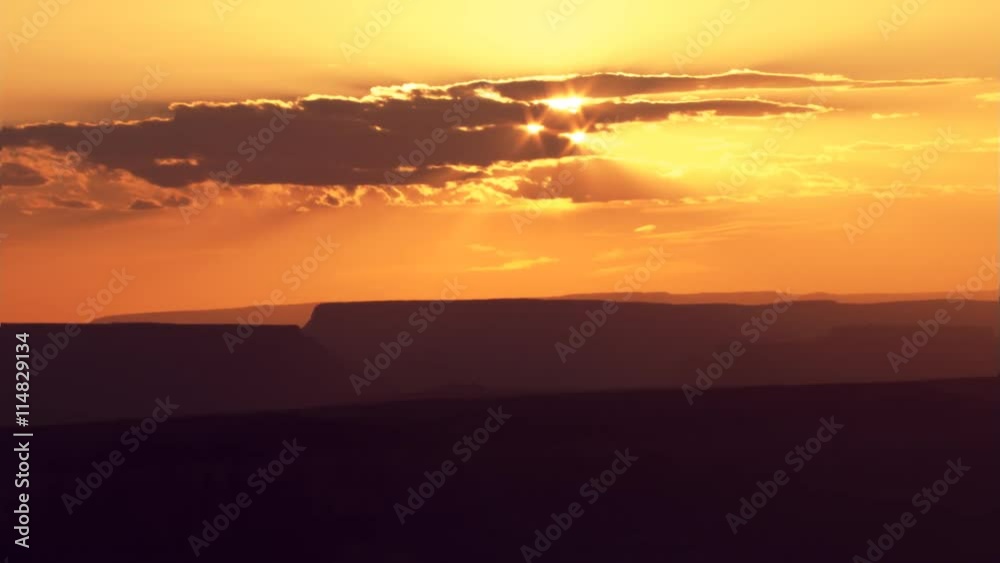 Slow flight over golden mesas at sunset Slow flight over golden mesas at sunset