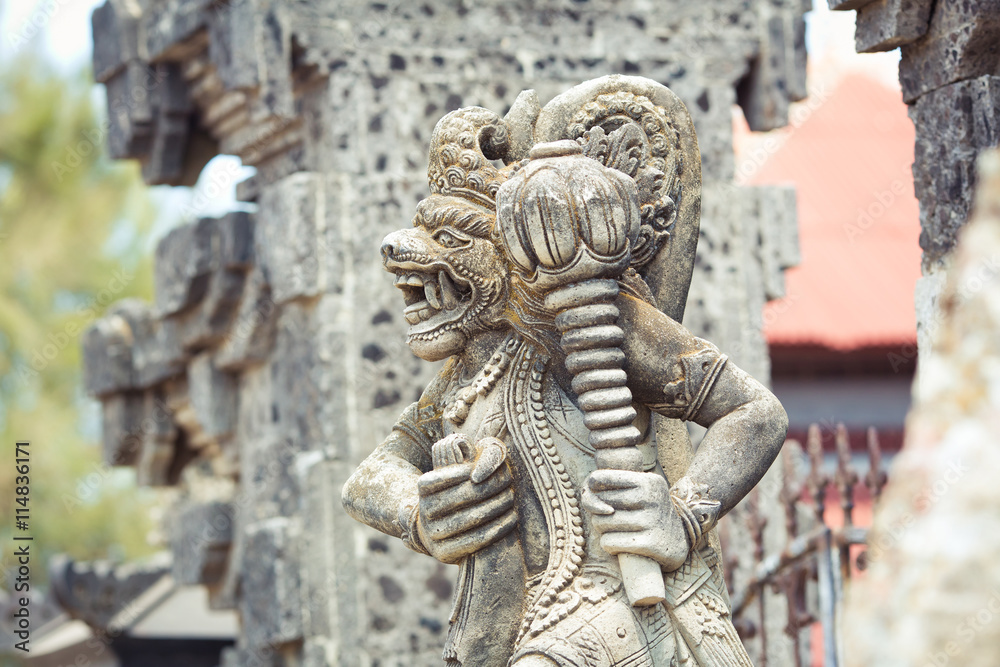 statue at the entrance to the temple, Bali, Indonesia