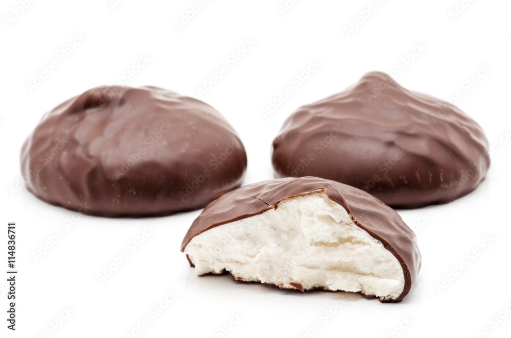 chocolate covered marshmallows on white background chocolate covered marshmallows on white background