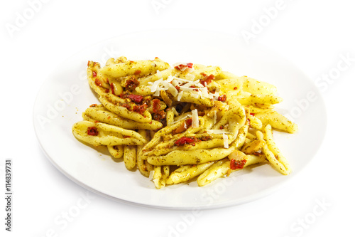 pasta variety called capunti with garlic and oil, pickled tomatoes and parmesan cheese,  isolated on white