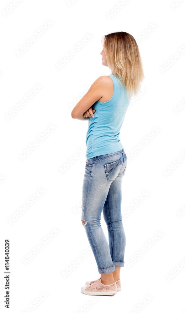 back view of standing young beautiful woman. back view of standing young beautiful woman.
