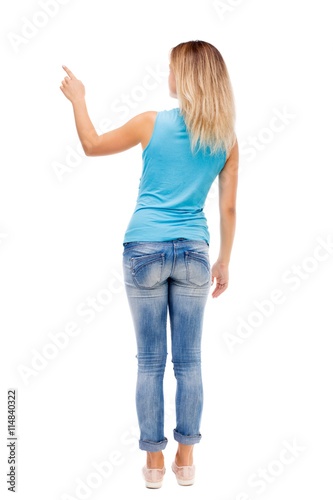 Back view of pointing woman.