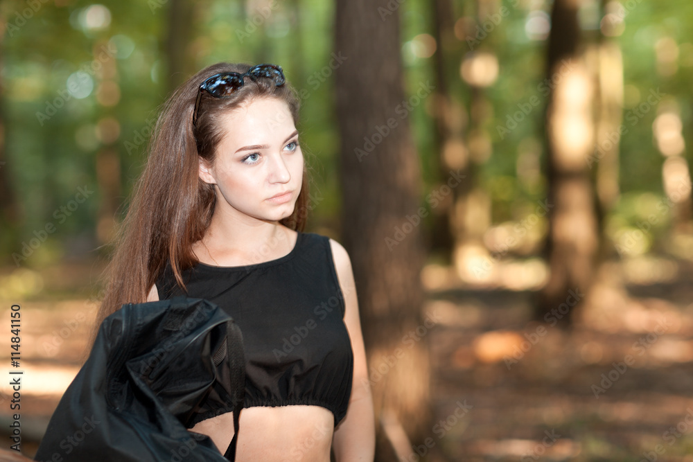 Portrait of a girl in the woods Portrait of a girl in the woods