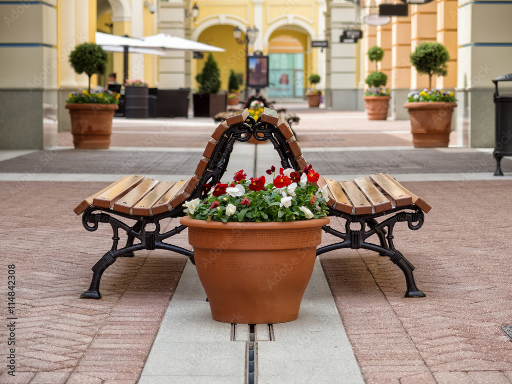 Empty benches and flower pots