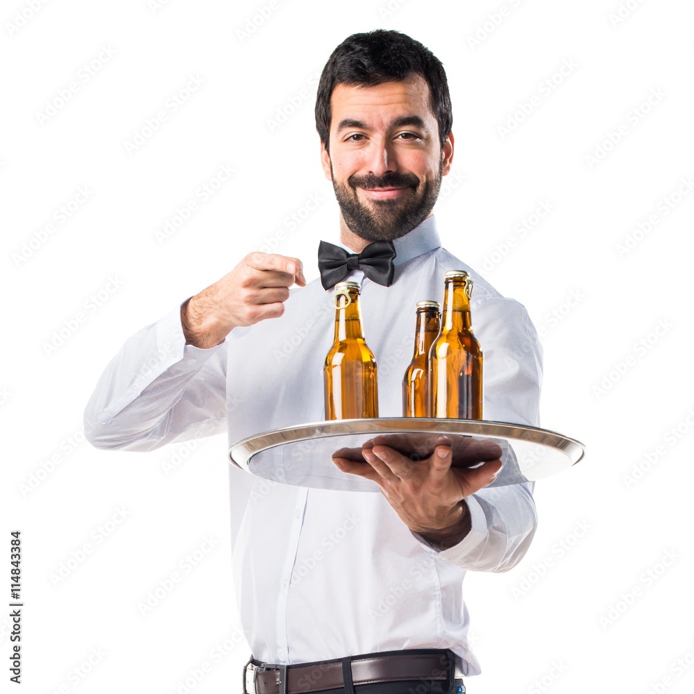 Waiter with beer bottles on the tray Waiter with beer bottles on the tray