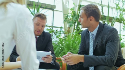 The man explains colleagues plan for the future work