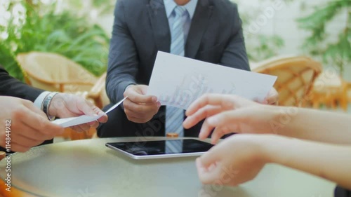 Close up of a hand business of the people discussing financial schedules