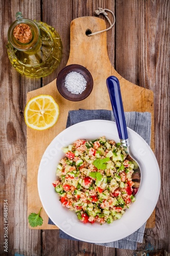 homemade tabbouleh salad with quinoa and vegetables