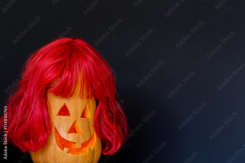 Scary Halloween pumpkinswith with red hair