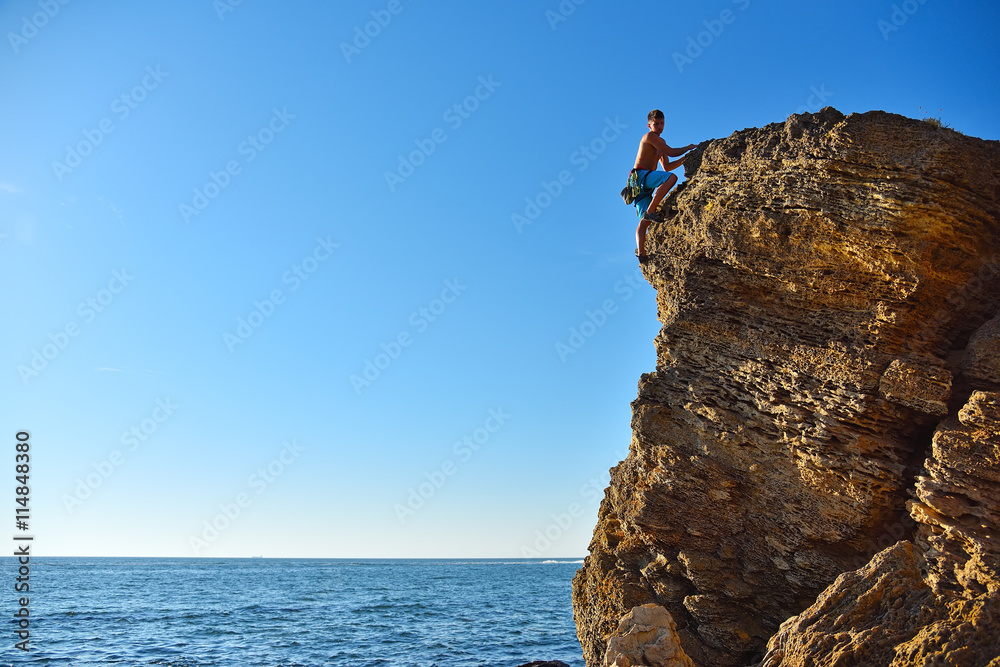 Fototapeta premium male rock climber