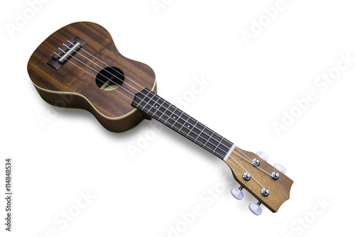 Vintage ukulele on white isolated.