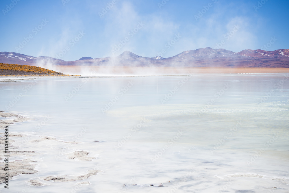 Naklejka premium Hot water ponds and frozen lake on the Andes, Bolivia