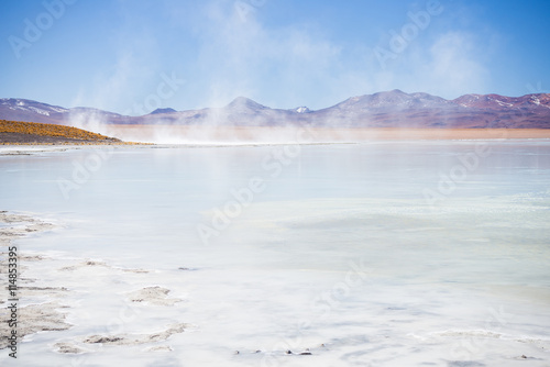 Hot water ponds and frozen lake on the Andes  Bolivia