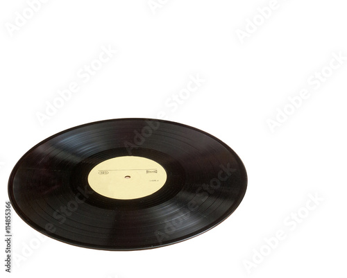 Vinyl record with copy space in front of a collection albums dummy titles, isolated on white background. vintage process