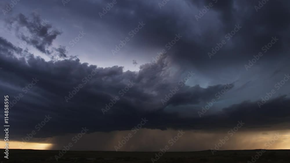 Thunderstorm with pouring rain and multiple lightning flashes over prairie, time lapse Thunderstorm with pouring rain and multiple lightning flashes over prairie, time lapse