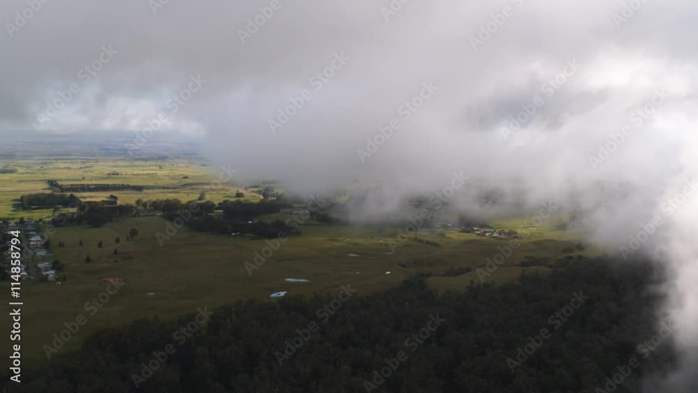 Flying through mist over landscape of Waimea (Kamuela) on Hawaii's Big Island. Shot in 2010. Flying through mist over landscape of Waimea (Kamuela) on Hawaii's Big Island. Shot in 2010.