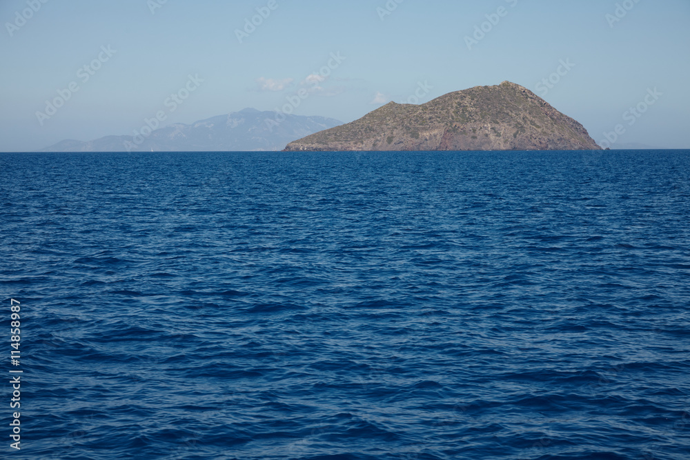 It has long been extinct volcano Stroggili. Greek island. It has long been extinct volcano Stroggili. Greek island.