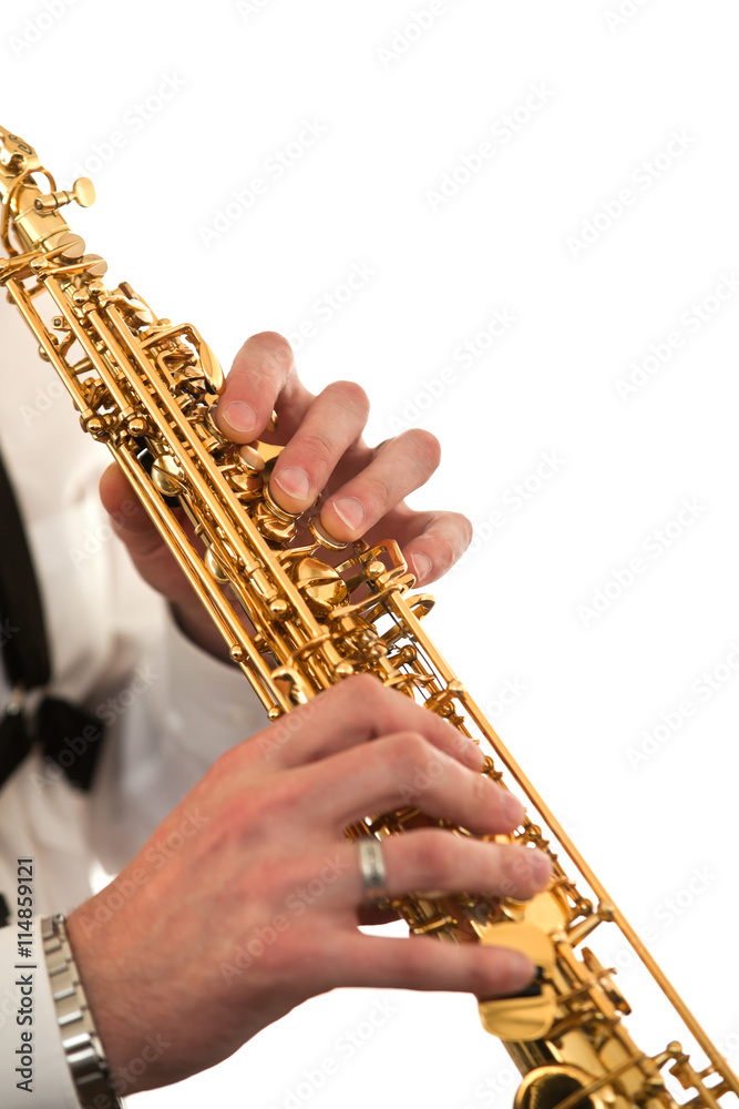 Obraz premium Hands musician playing the saxophone closeup