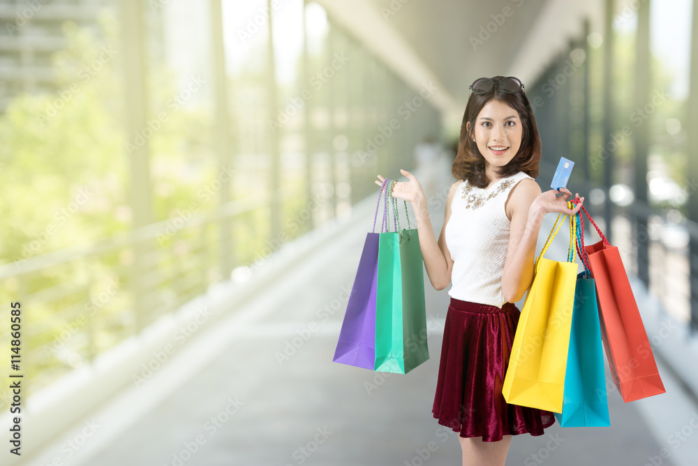 woman show her shopping bag and credit card woman show her shopping bag and credit card