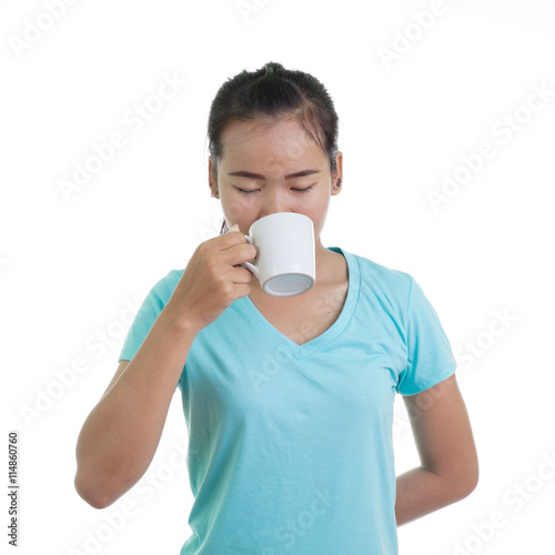 Asian woman drinking hot coffee