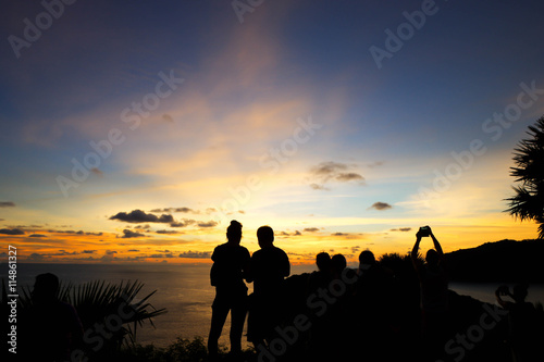 travelers watching sunset at Promthep Cave  Phuket  Thailand