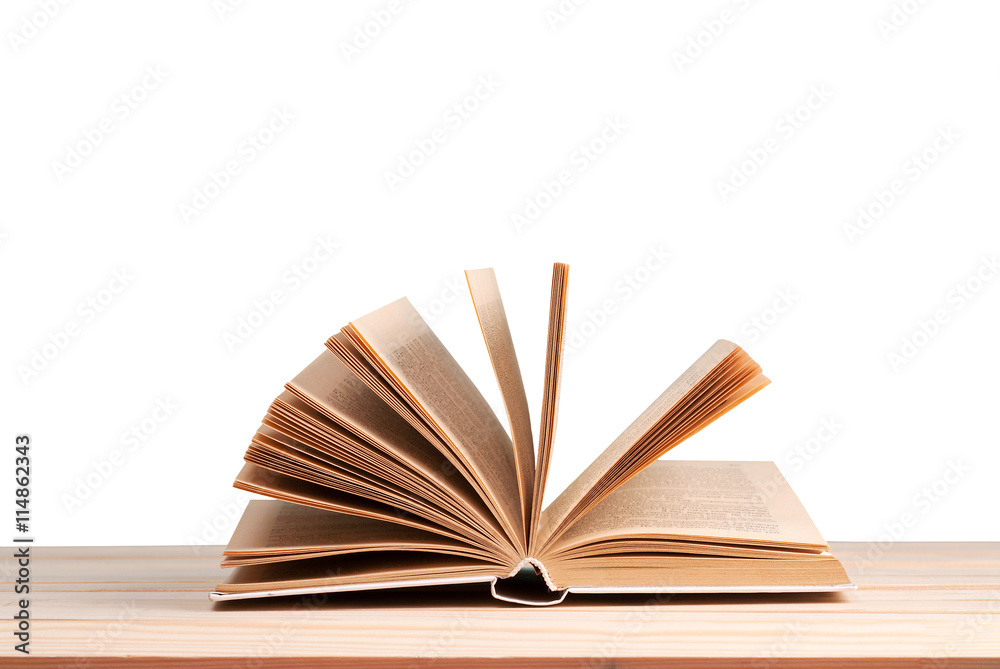 Open book isolated on wooden table. Back to school. Copy space Open book isolated on wooden table. Back to school. Copy space