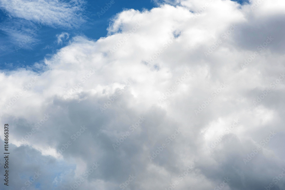 Fototapeta premium Blue summer sky with white clouds, natural background.