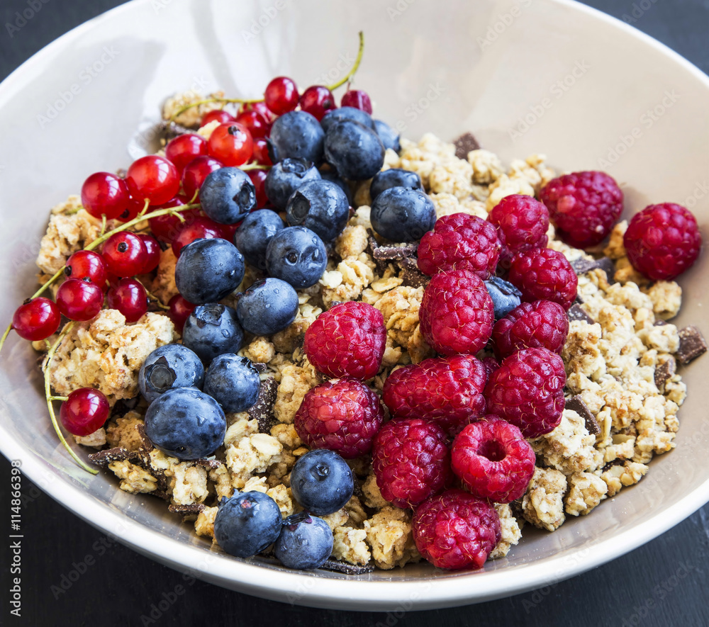 Bowl of healthy muesli with fresh berries Bowl of healthy muesli with fresh berries