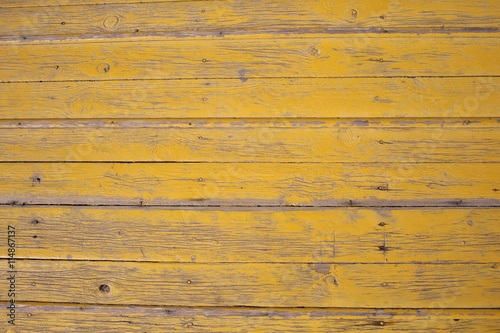 Old yellow wood plank wall texture background