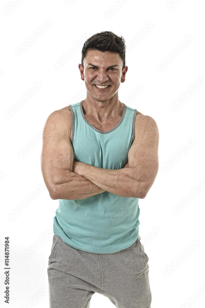 40s man bodybuilder smiling happy in corporate cross arms pose wearing singlet 40s man bodybuilder smiling happy in corporate cross arms pose wearing singlet