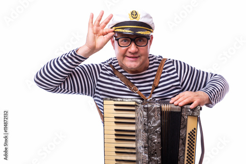 Photography Sailor showman singer with musical instruments drum and accordion on white back