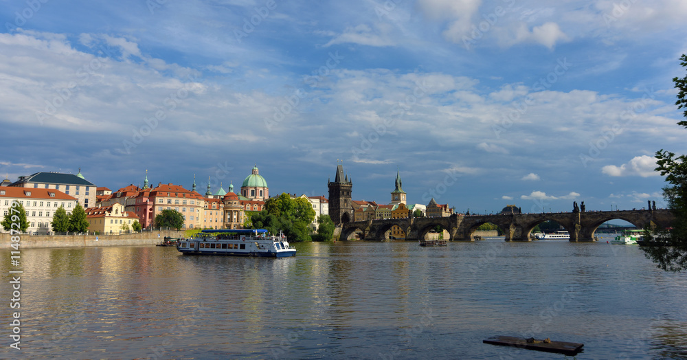 Vltava river with boats and bridges